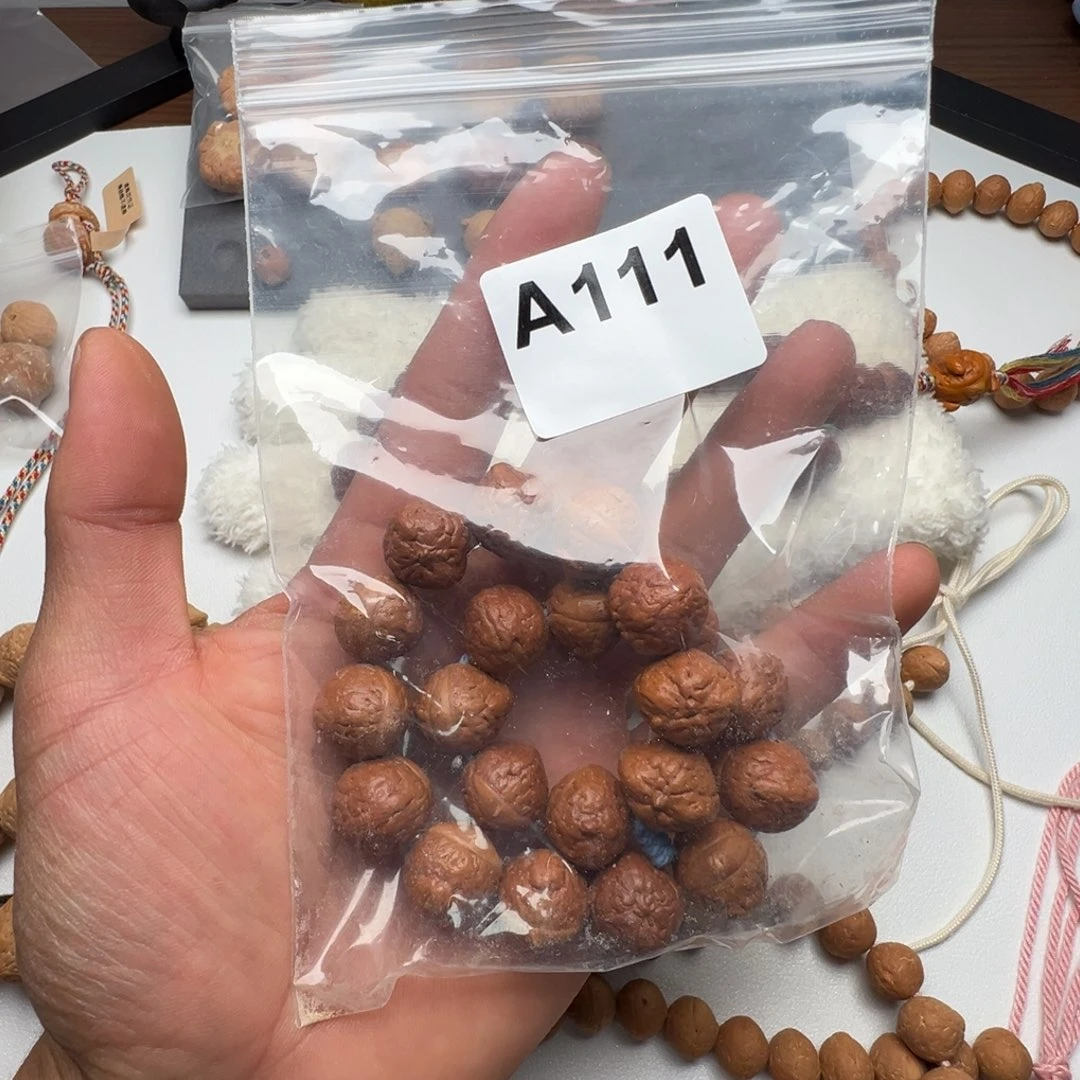 陸***籽把件凤眼菩提天使