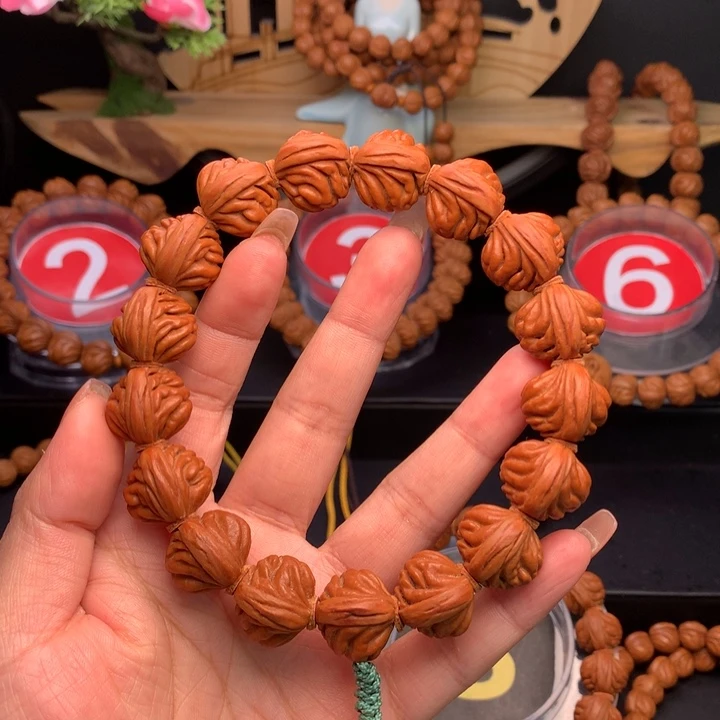 桃核吊坠赛*洋1.8野生红魔手串