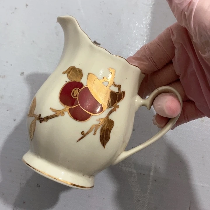 瓷片春蕾红果雕金奶缸