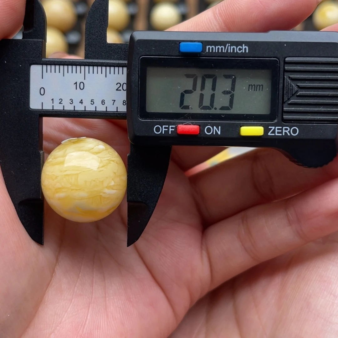 ****哥琥珀未镶嵌裸石蜜蜡圆珠笑