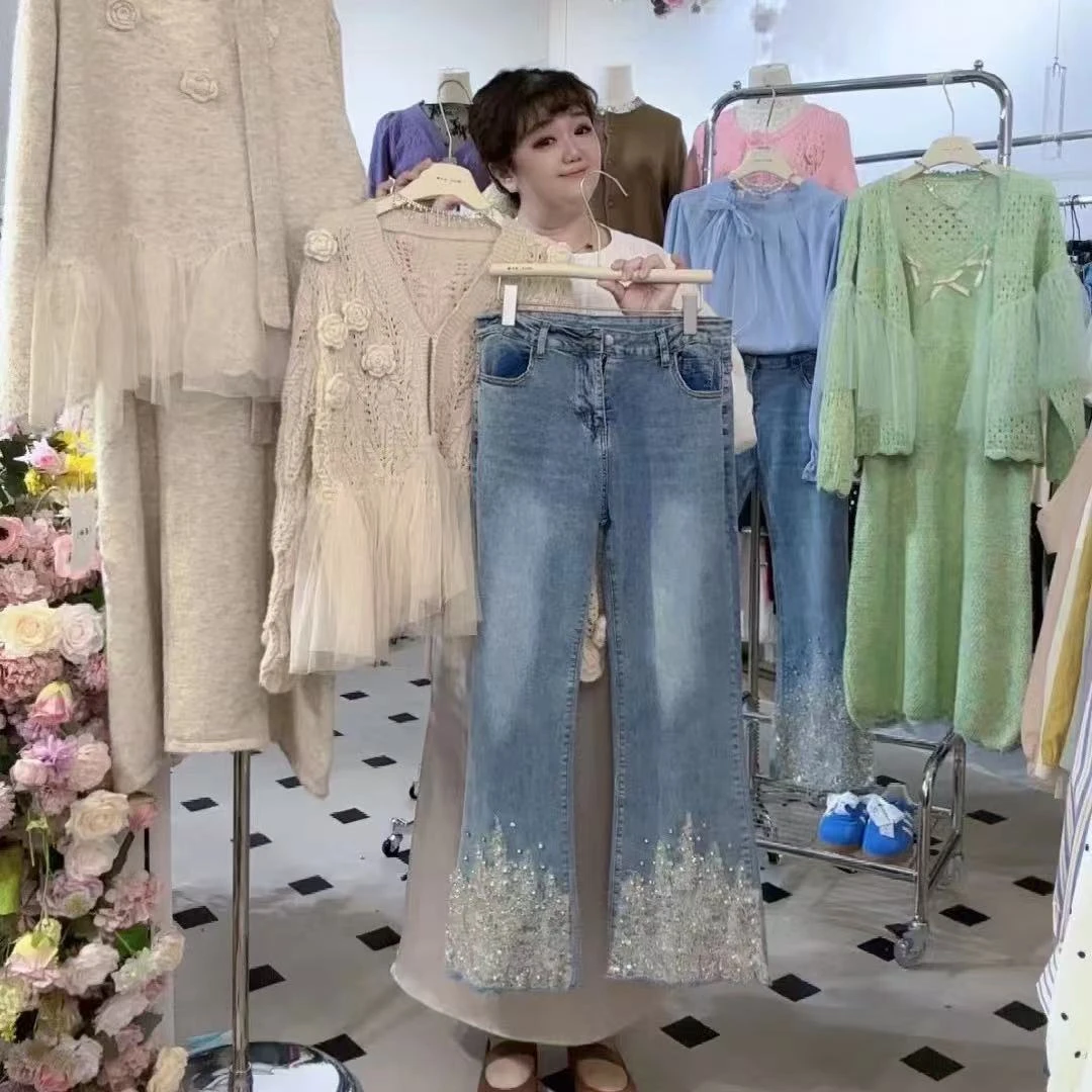 0067秋冬新款洋气重工钉珠镶钻牛仔裤下摆喇叭