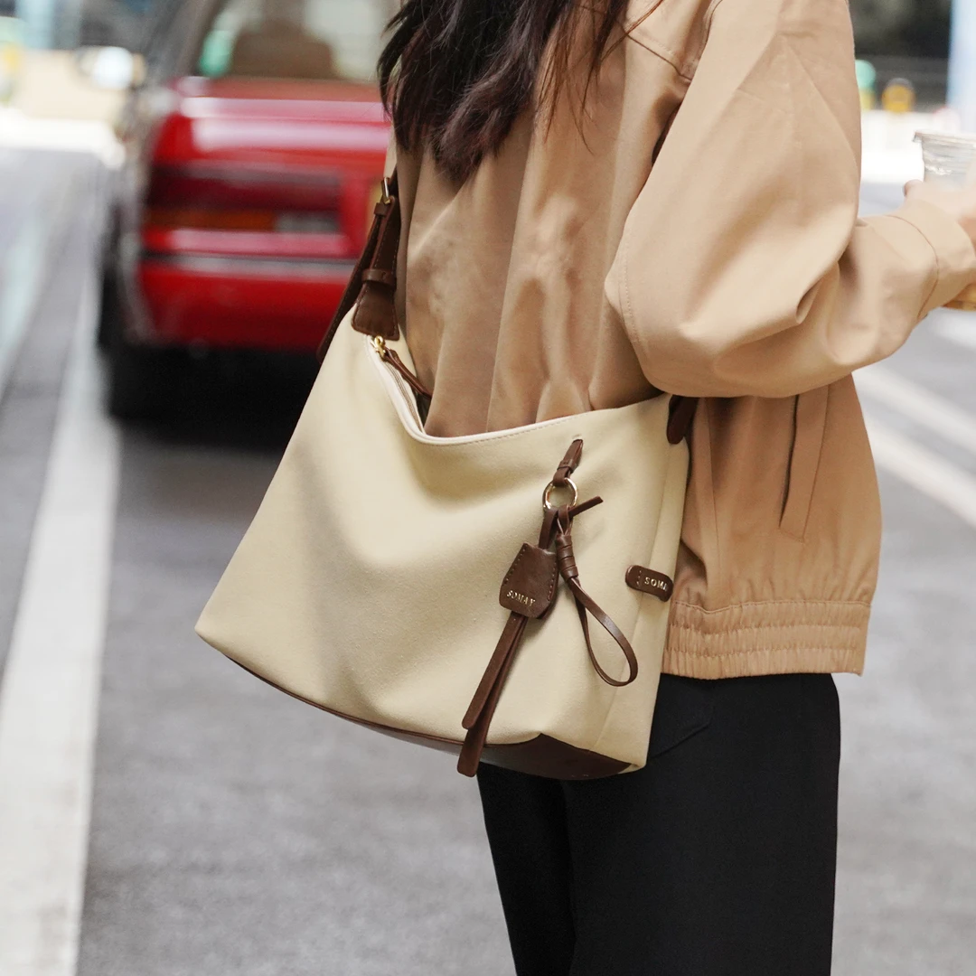 腋下包包女款爆款2025新款百搭单肩斜挎包上班专用通勤大容量女包