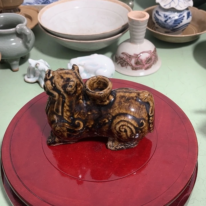 用****2一个酱釉的小竹台