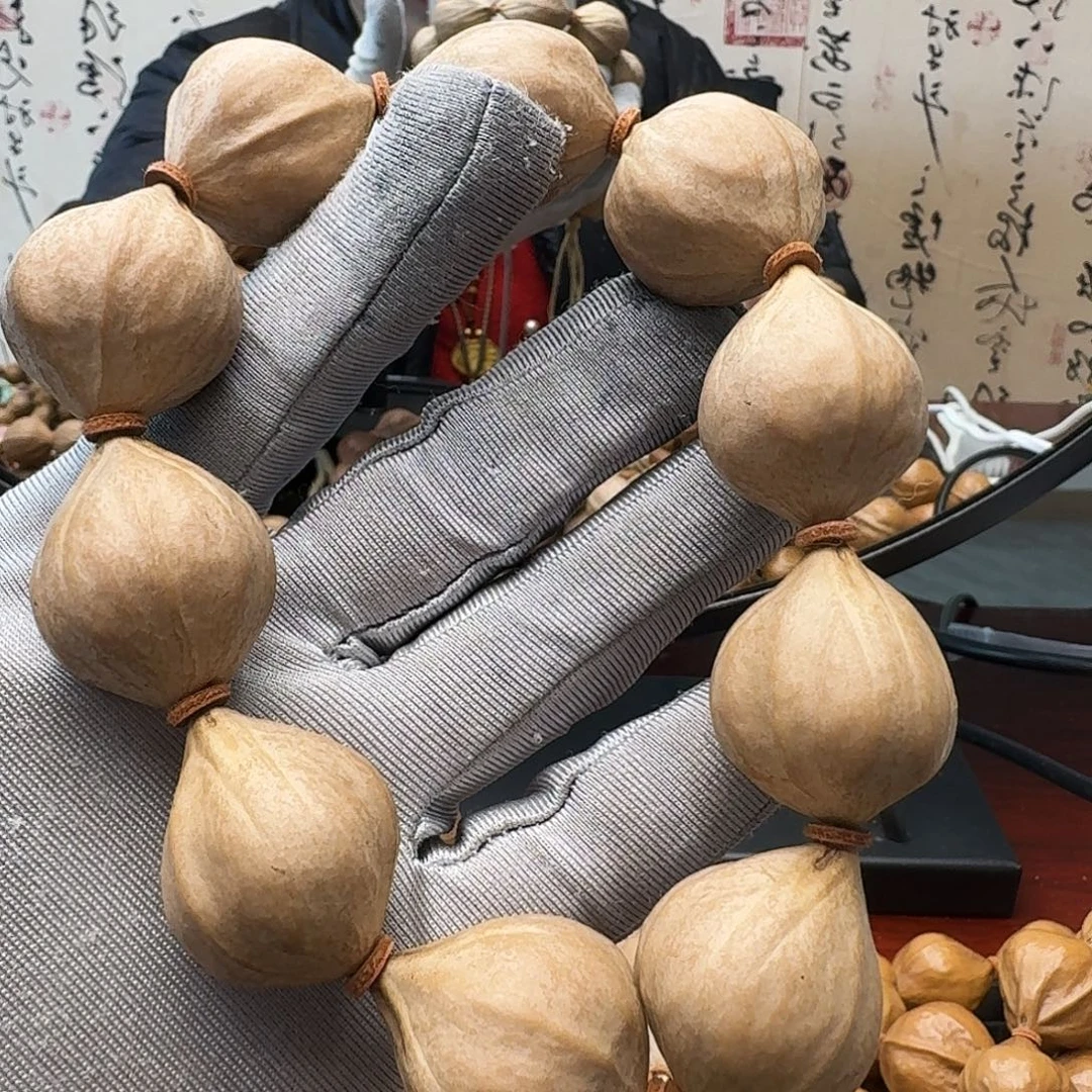 天***明手串橄榄核蒜头核