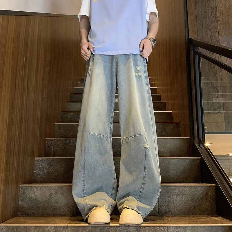 美式破洞弯刀牛仔裤男夏季潮流毛边设计微喇拖地裤宽松阔腿休闲裤