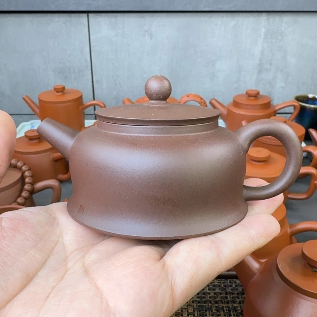 紫砂茶壶微瑕半手曲钟