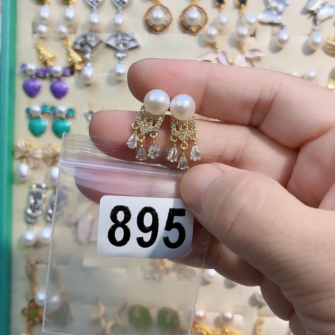 牧***牧淡水珍珠耳饰合金