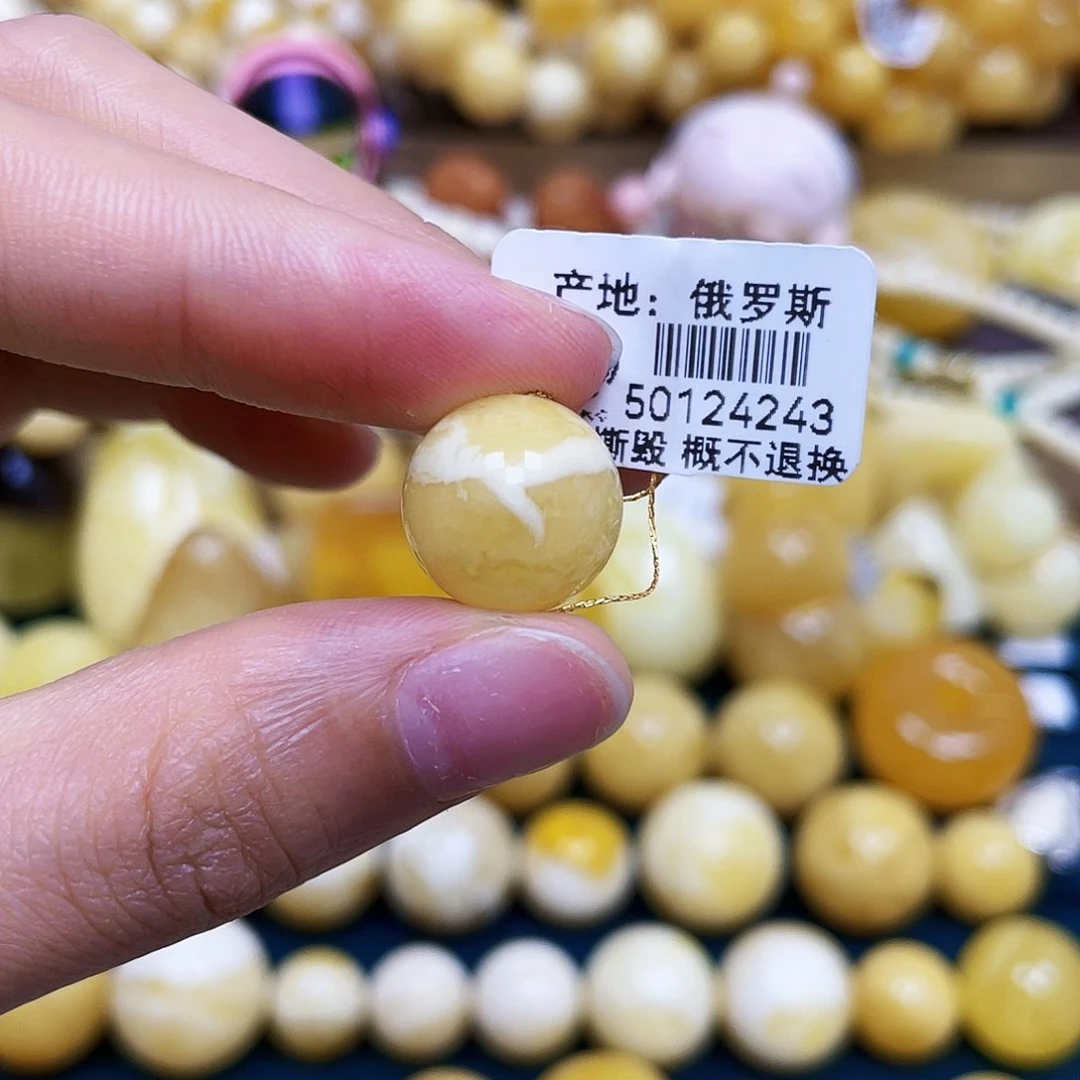 宁****未镶嵌蜜蜡裸石13.9mm.圆珠