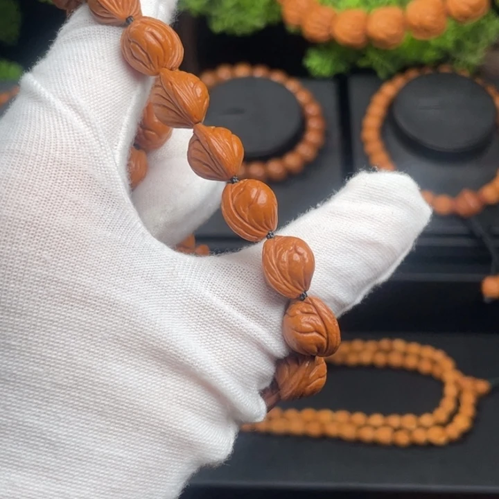 乐***天木质类精品桃核手持