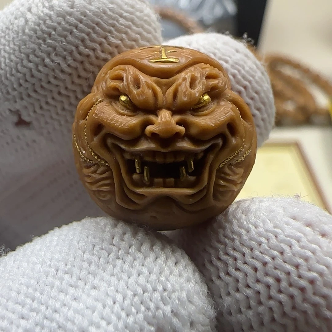 猴头核桃吊坠十*虎僧镶嵌24k