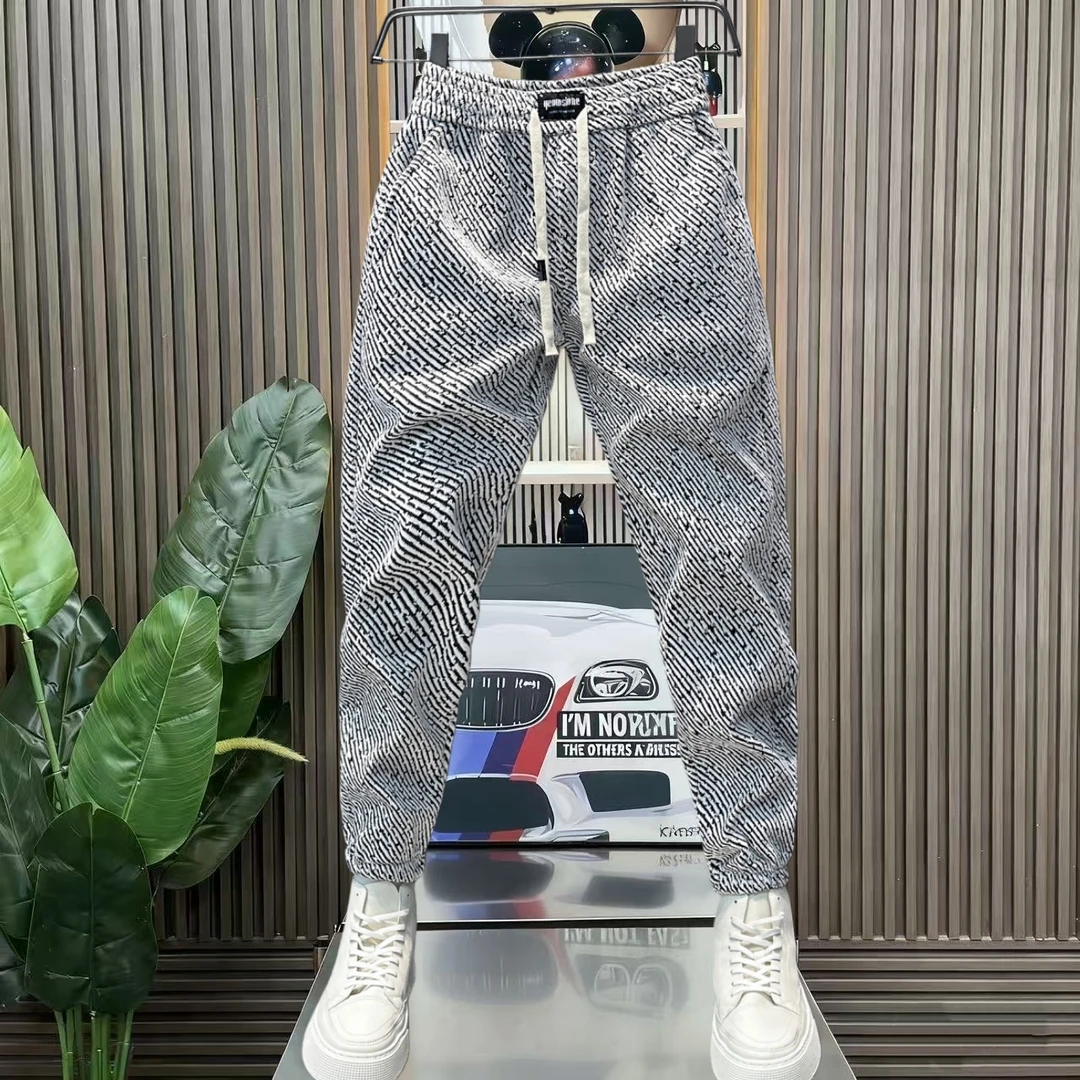 秋冬新款潮流男士加绒加厚休闲裤松紧腰束脚裤百搭宽松运动卫裤