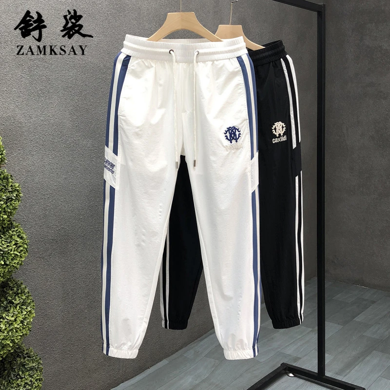 2025夏季新款高端轻奢白色裤子男潮牌薄款束脚运动休闲裤男士长裤