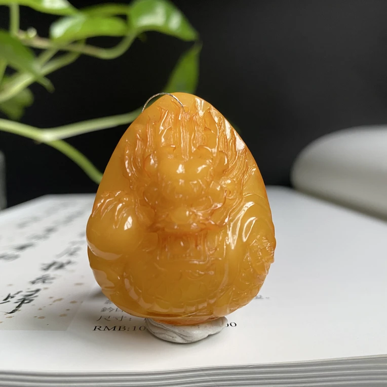 21天然无优化蜜蜡全手工雕刻龙挂坠