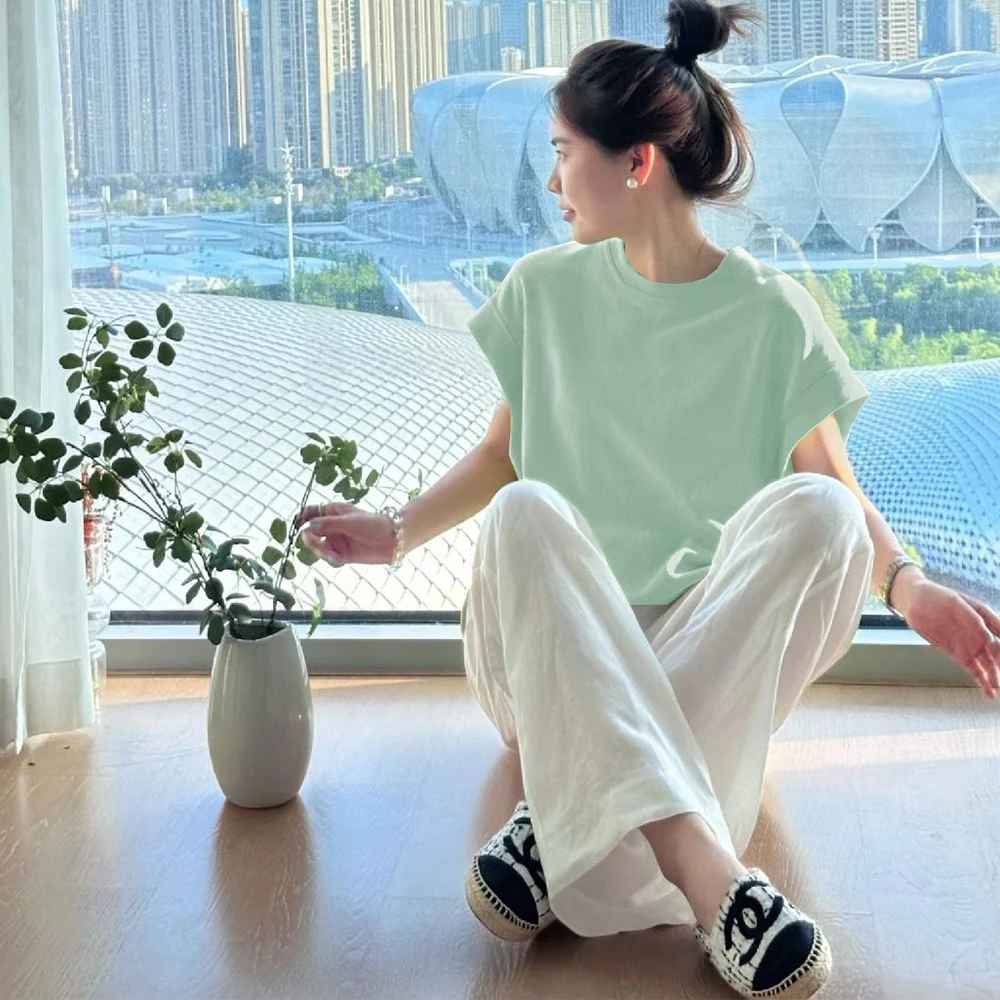 青柠绿色圆领宽松短袖T恤女新款夏季多巴胺穿搭温柔减龄遮肉上衣