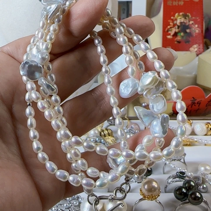 淡水珍珠小米珠带花瓣长项链有正常纹银S925镶嵌颜*