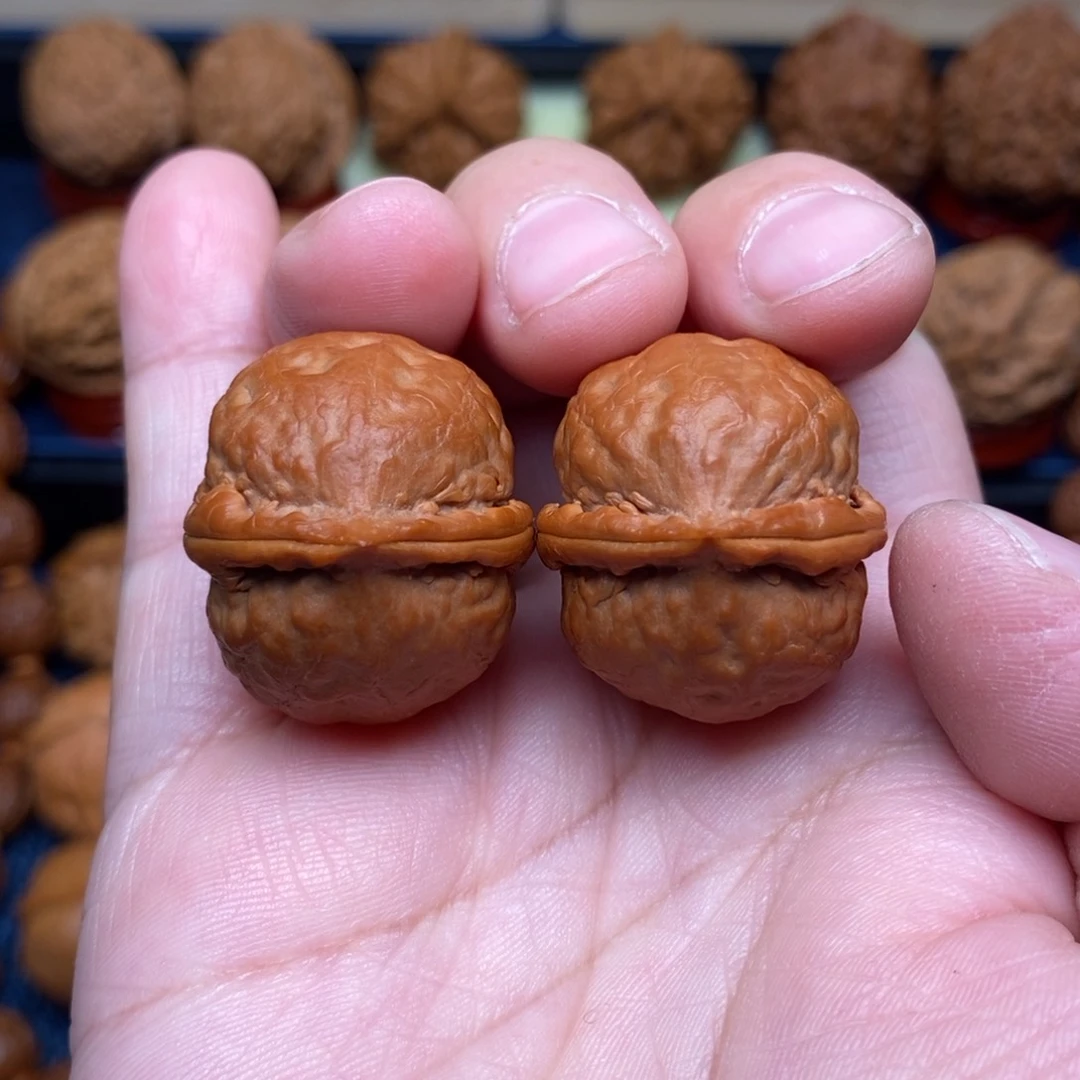 文玩核桃把件手捻佛肚元宝