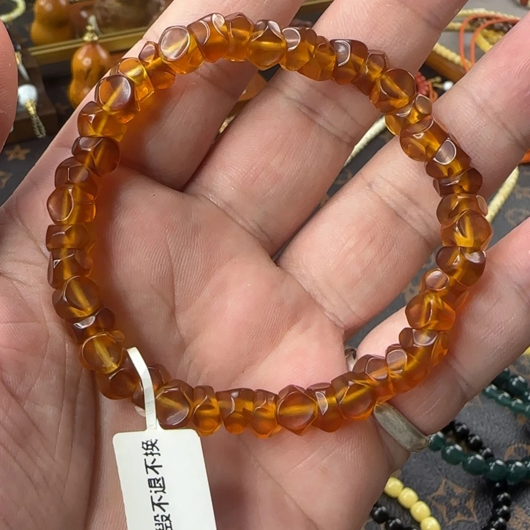 用***户琥珀未镶嵌手串8.2mm工费燃烧机大肠琥珀