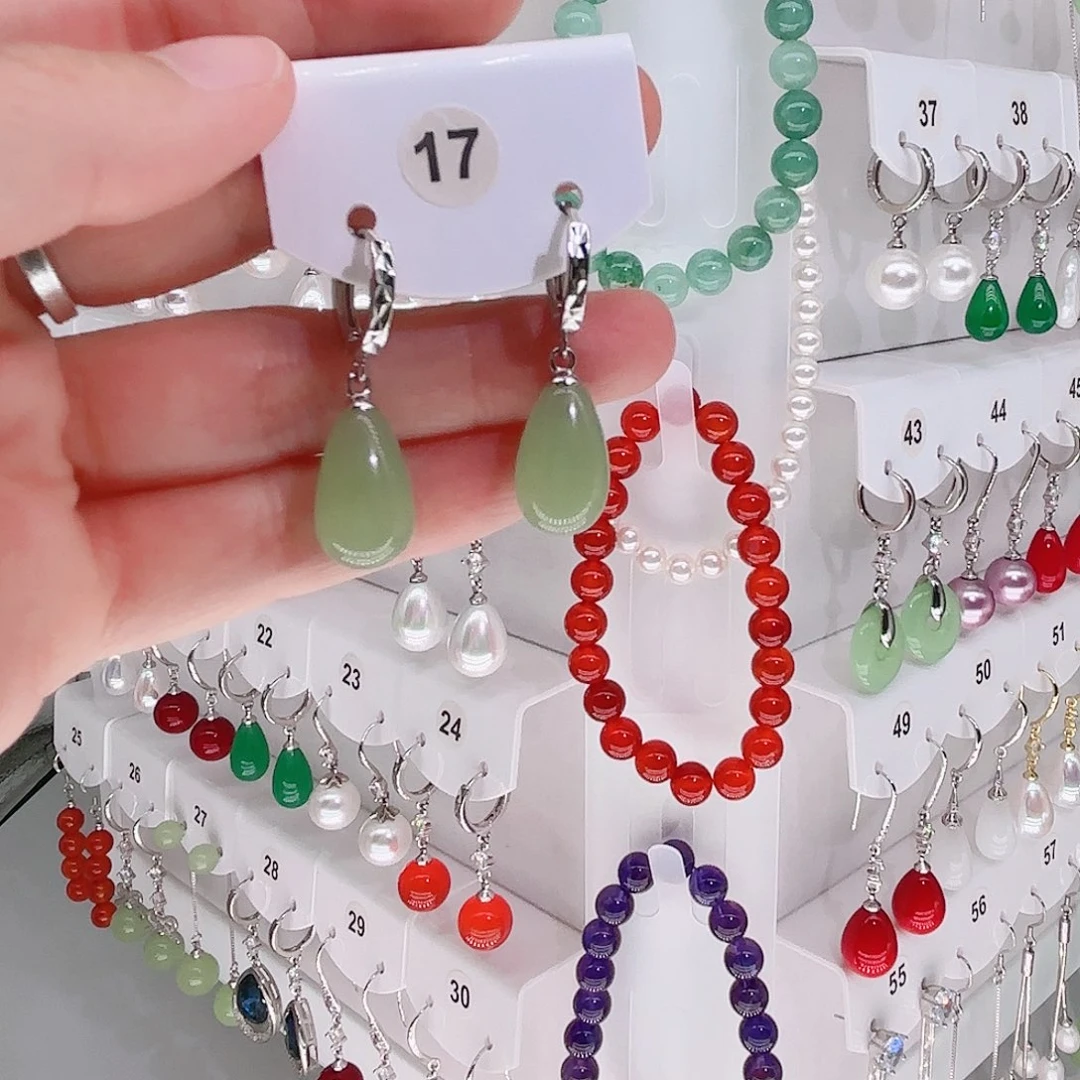 邱***姐淡水珍珠银S925镶嵌耳饰