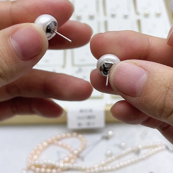 淡水珍珠耳饰银S925镶嵌往****0