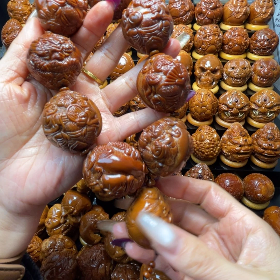 用***9把件橄榄核橄榄球