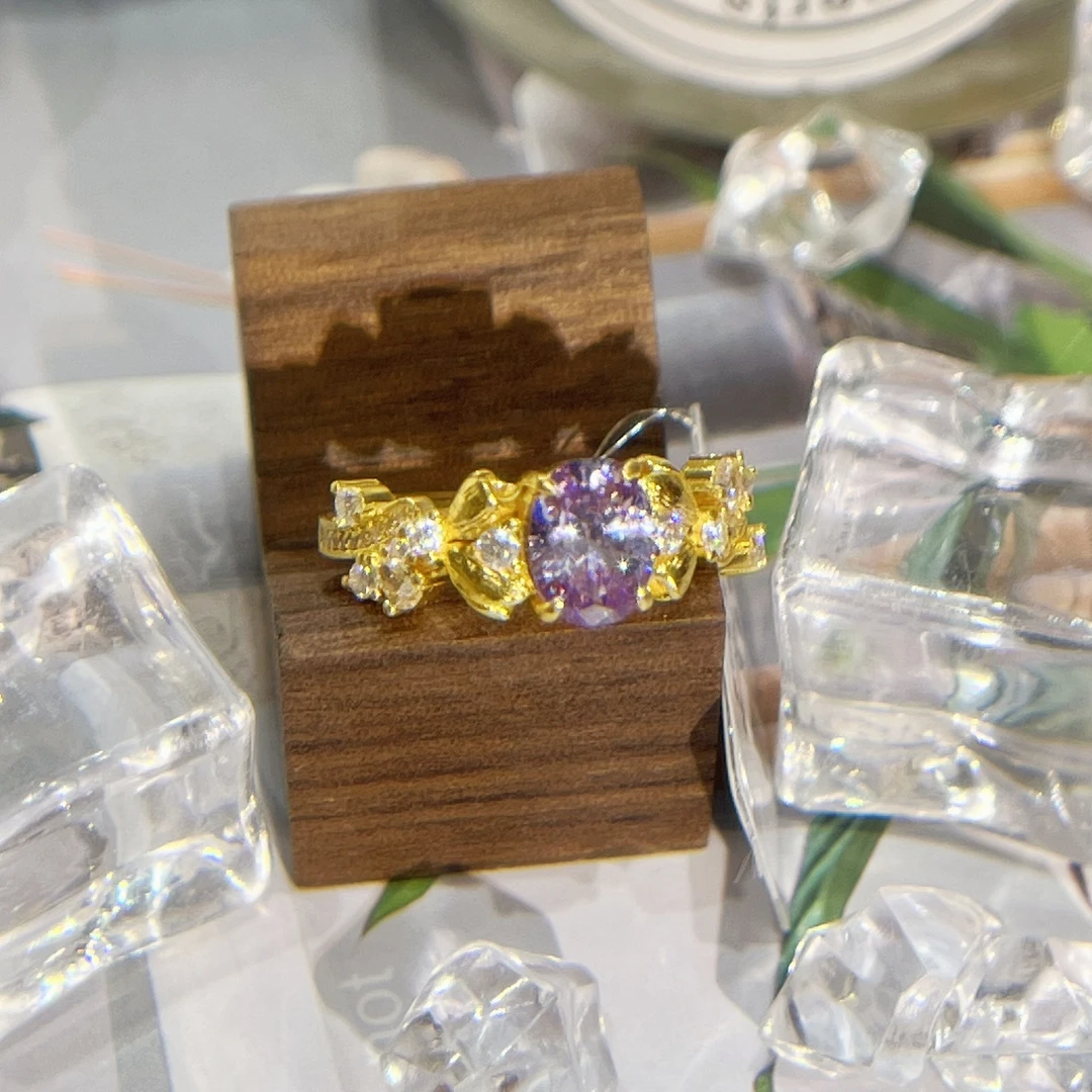 【麦绮珠宝】足金999古法镶嵌莫桑戒指紫色椭圆紫荆花活口可调节