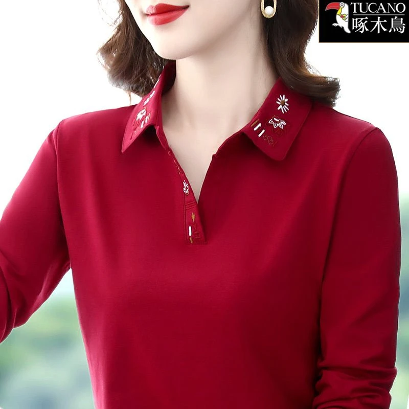 啄木鸟新款刺绣纽扣POLO衫女长袖T恤2025年秋季纯色翻领设计上衣