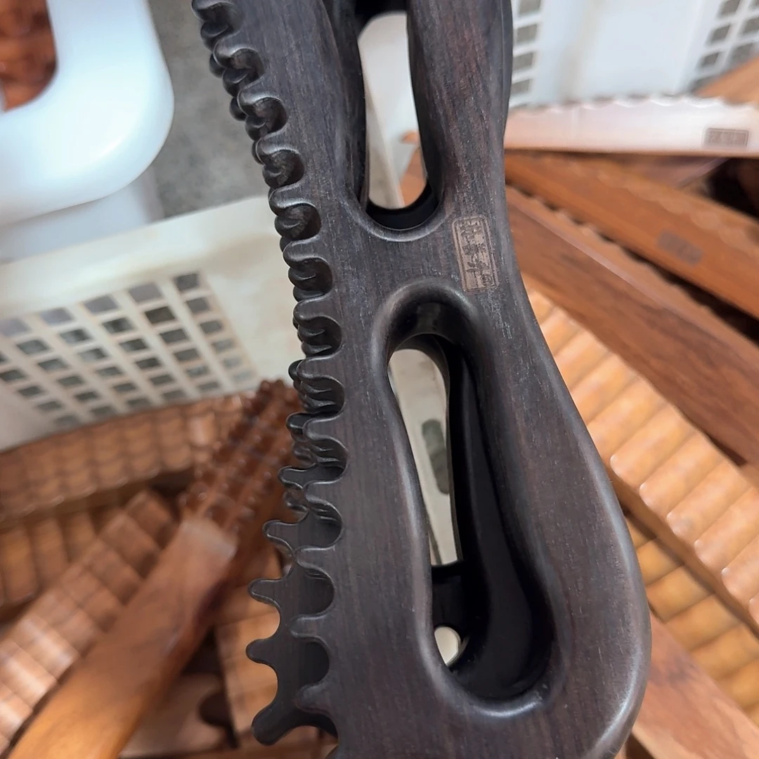 紫光檀三排双孔推板瑕疵