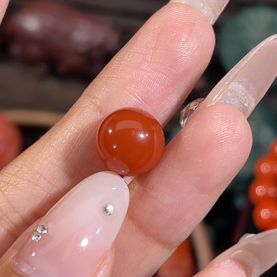 鲸***海南红玛瑙未镶嵌圆珠10.3mm 不换退