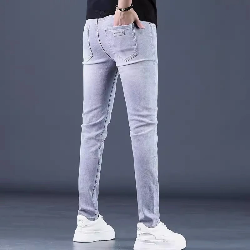 高端春夏新款时尚简约百搭牛仔裤男款修身小脚弹力休闲帅气男裤子