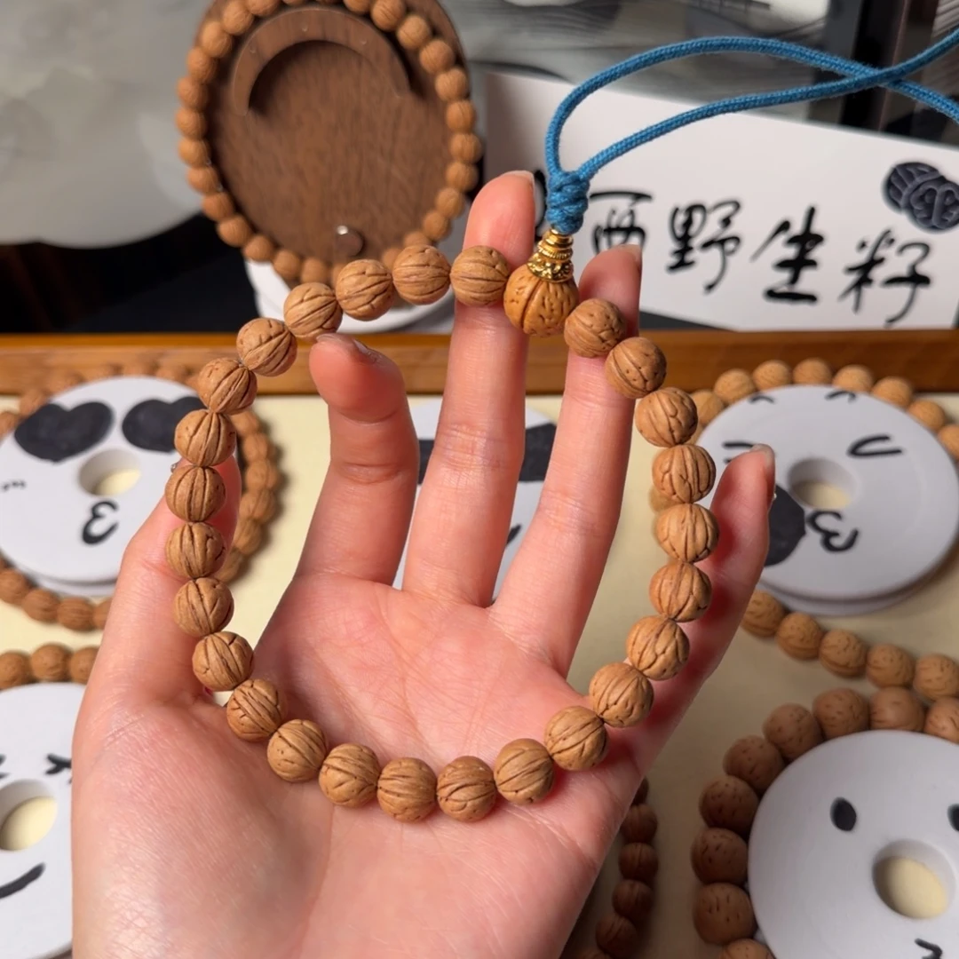 新***荣野生板牙脐小尺吊坠