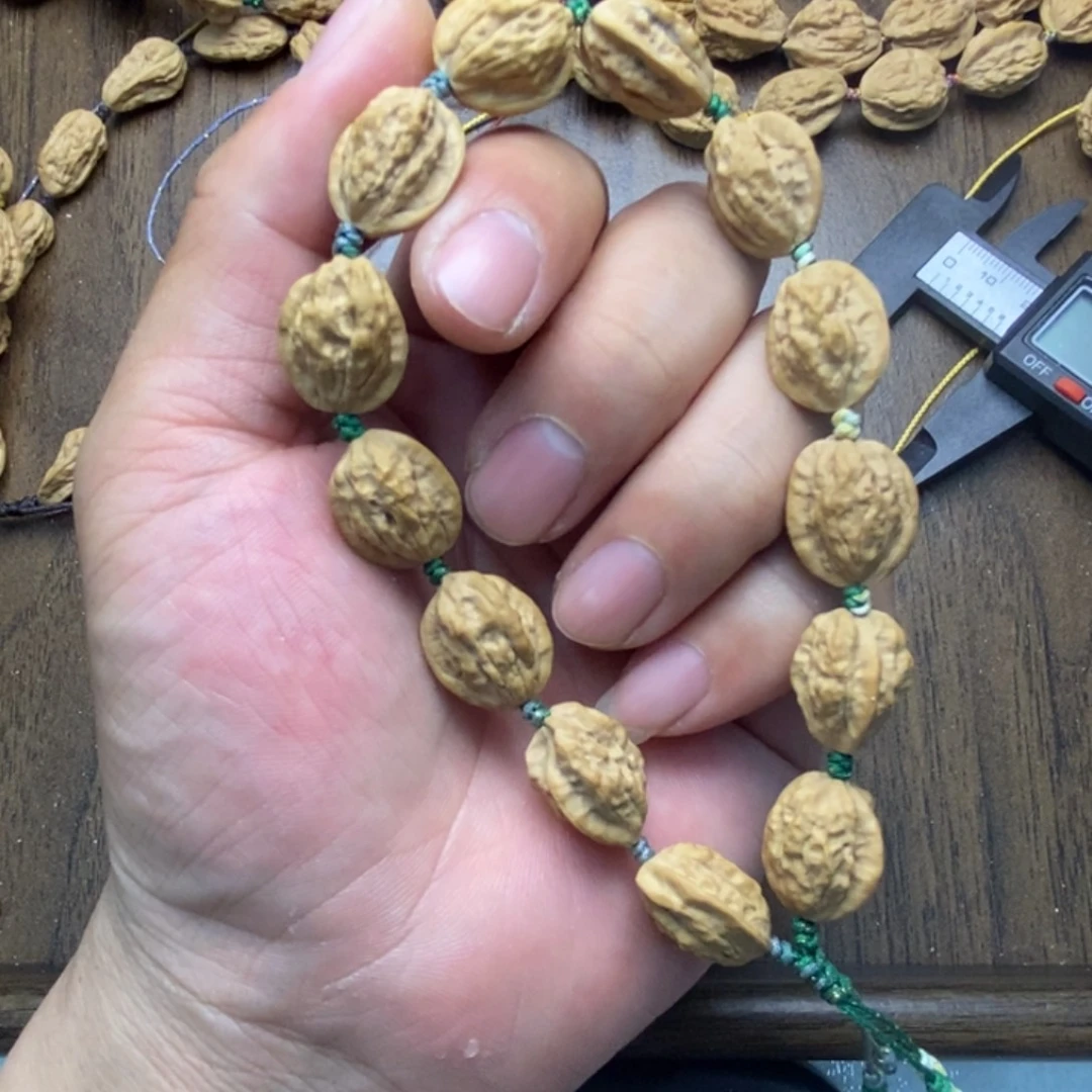 凡***爹文玩核桃吊坠文玩木质核桃手串