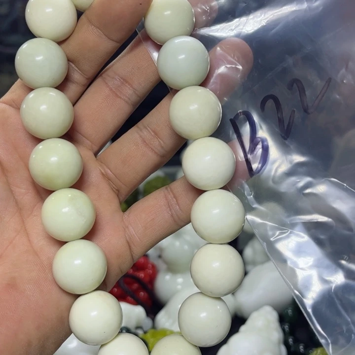 蛇纹石玉手持未镶嵌招**子