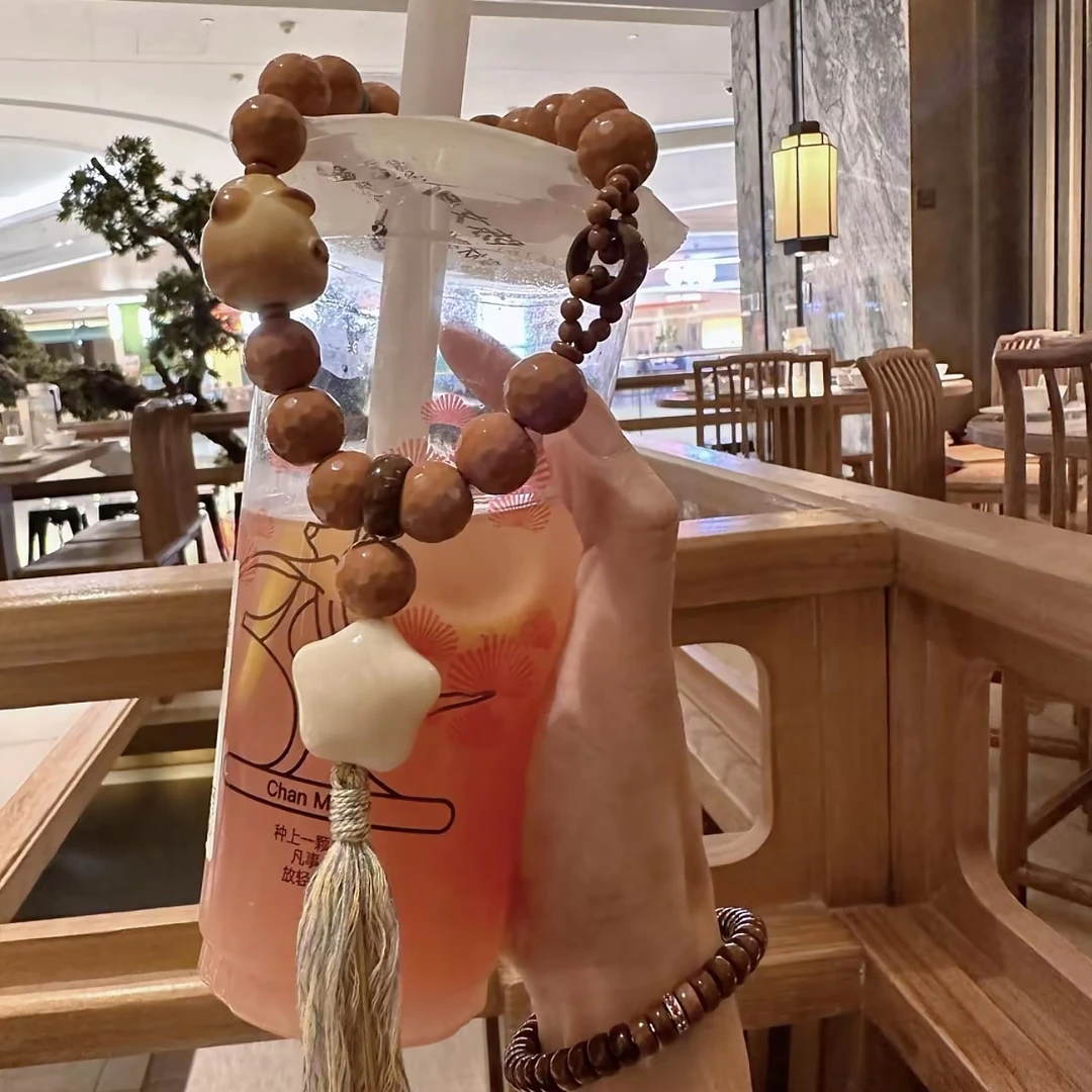 原创猴头钻石面手持象牙果配饰手持男女通用