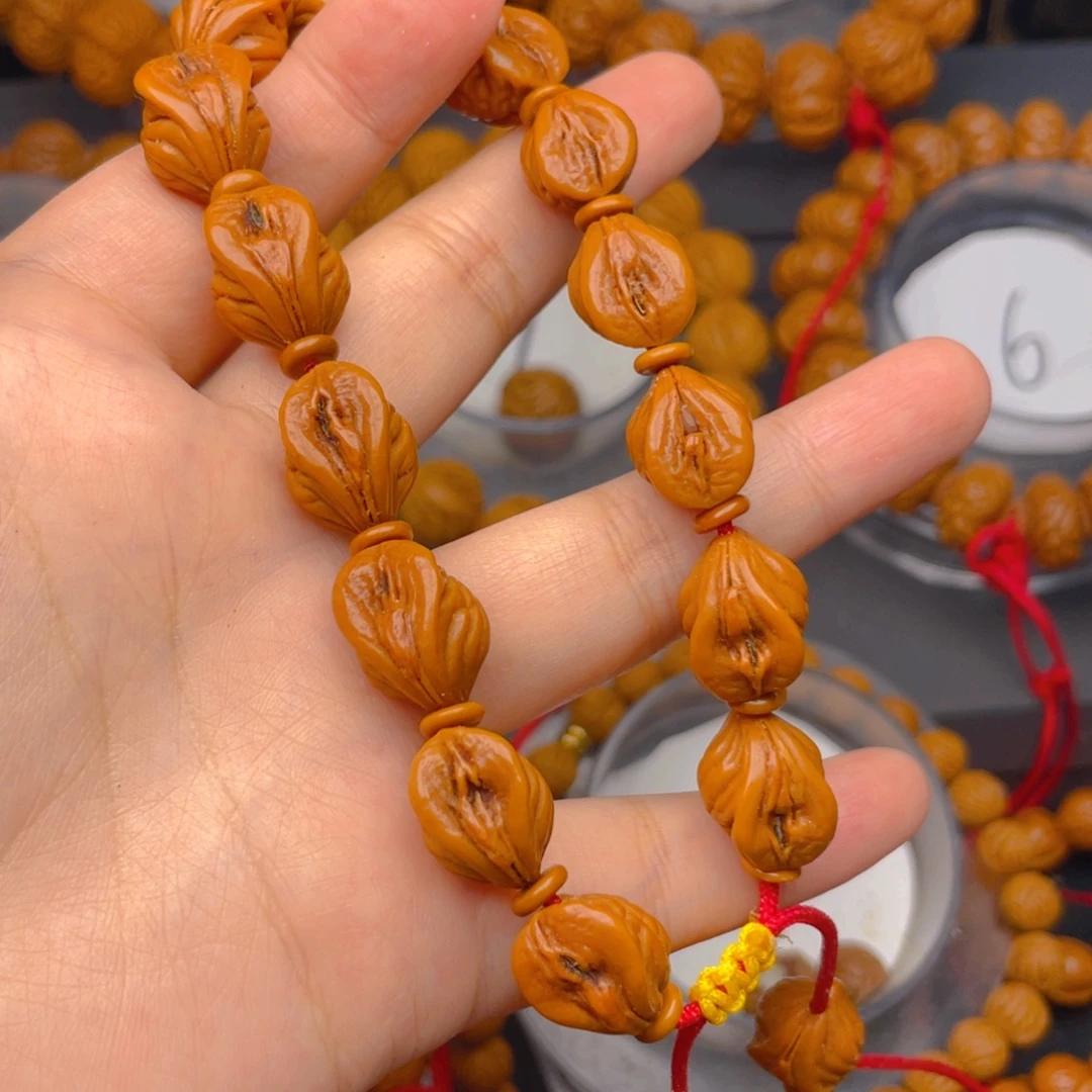 T***e吊坠桃核叶叶叶叶