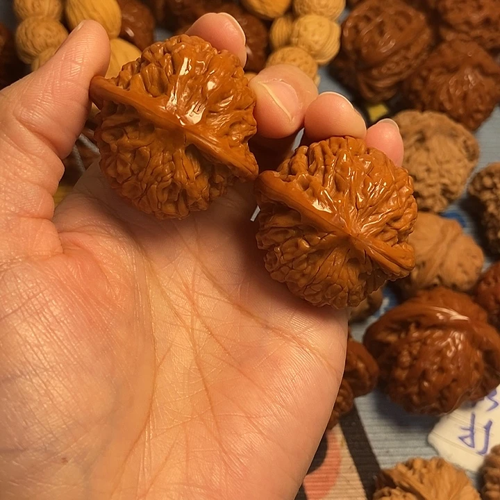 服***软文玩核桃吊坠磨盘