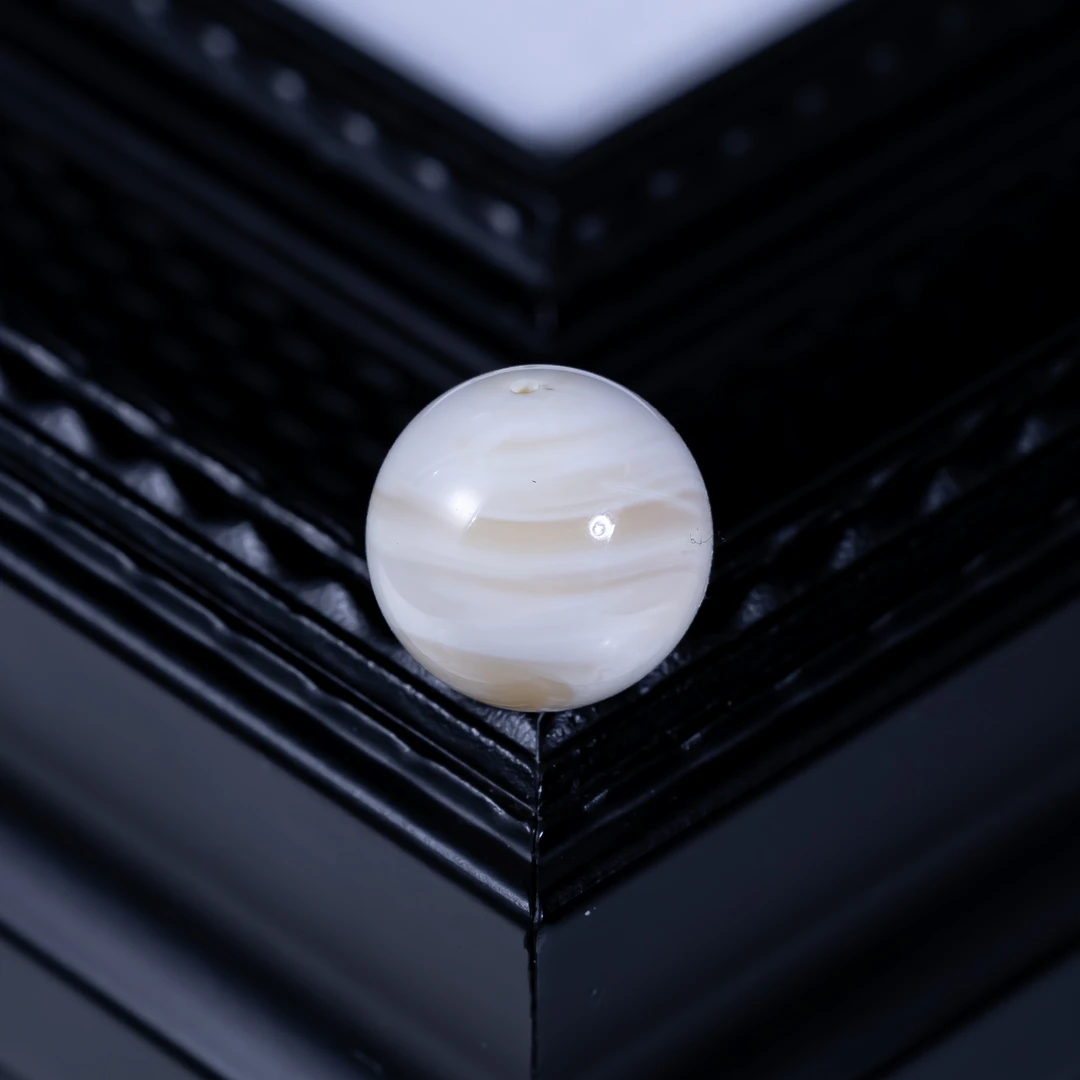 14.5mm焦皮橘粉白拉丝天眼妖圆珠 K400