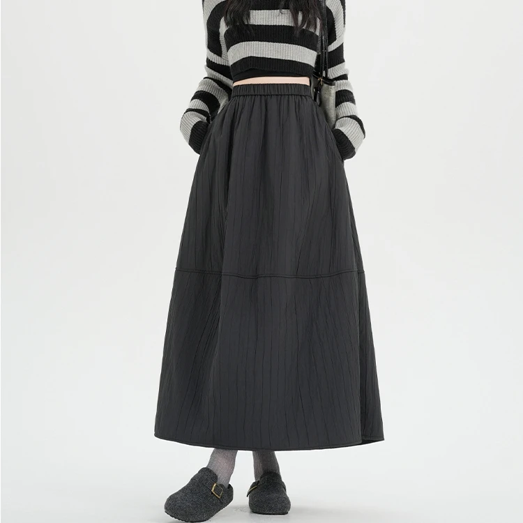 2025秋冬新款韩版高腰松紧腰肌理感赫本风中长款半身裙A字裙女款