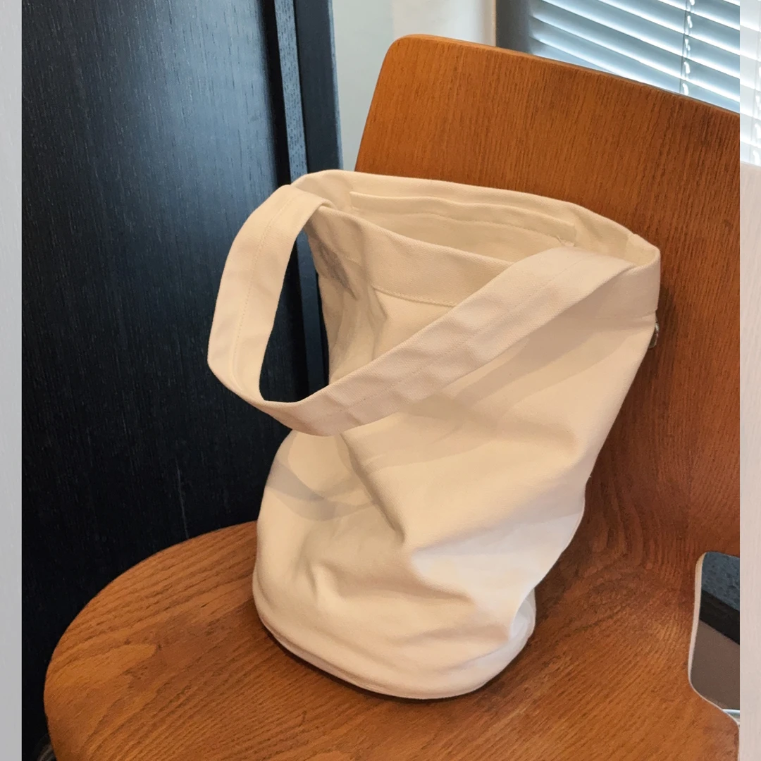 莉贝琳sisy百宝箱水桶包白色帆布大容量手提通勤包包女S25105AC01