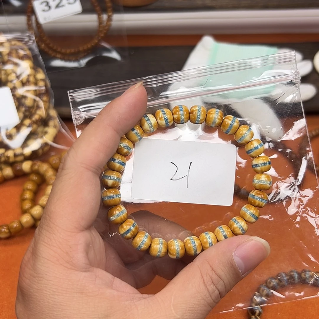 ᦗ****紫金鼠手串98实心一线天