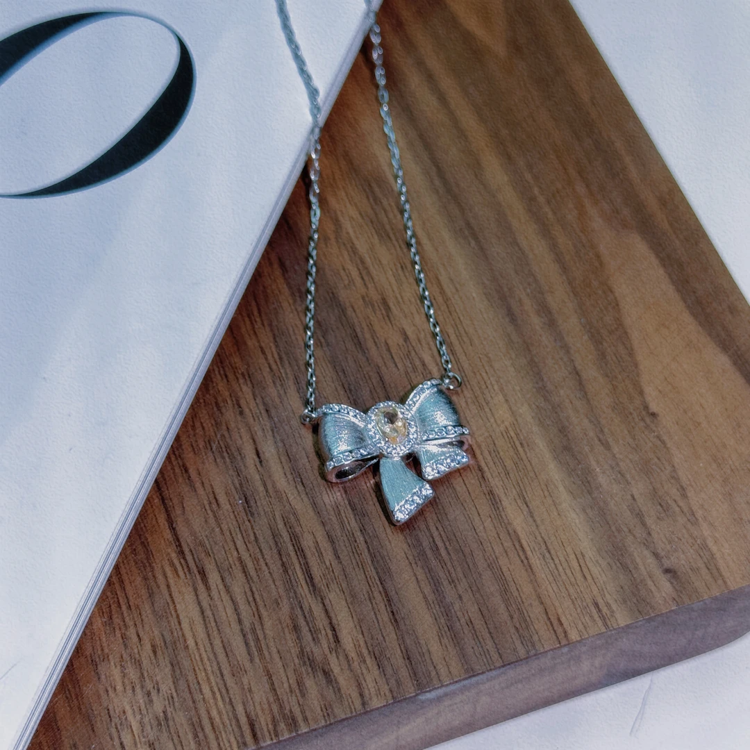 铜合成锆石项链 公主风不对称蝴蝶结项链