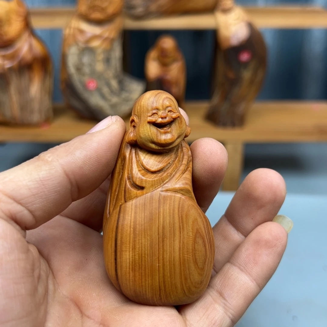 李***木木崖柏木摆件手把件