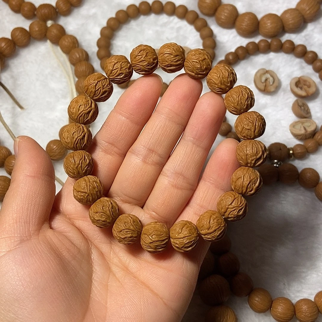 ǒ***ǒ木质类猴头核桃毒液手串