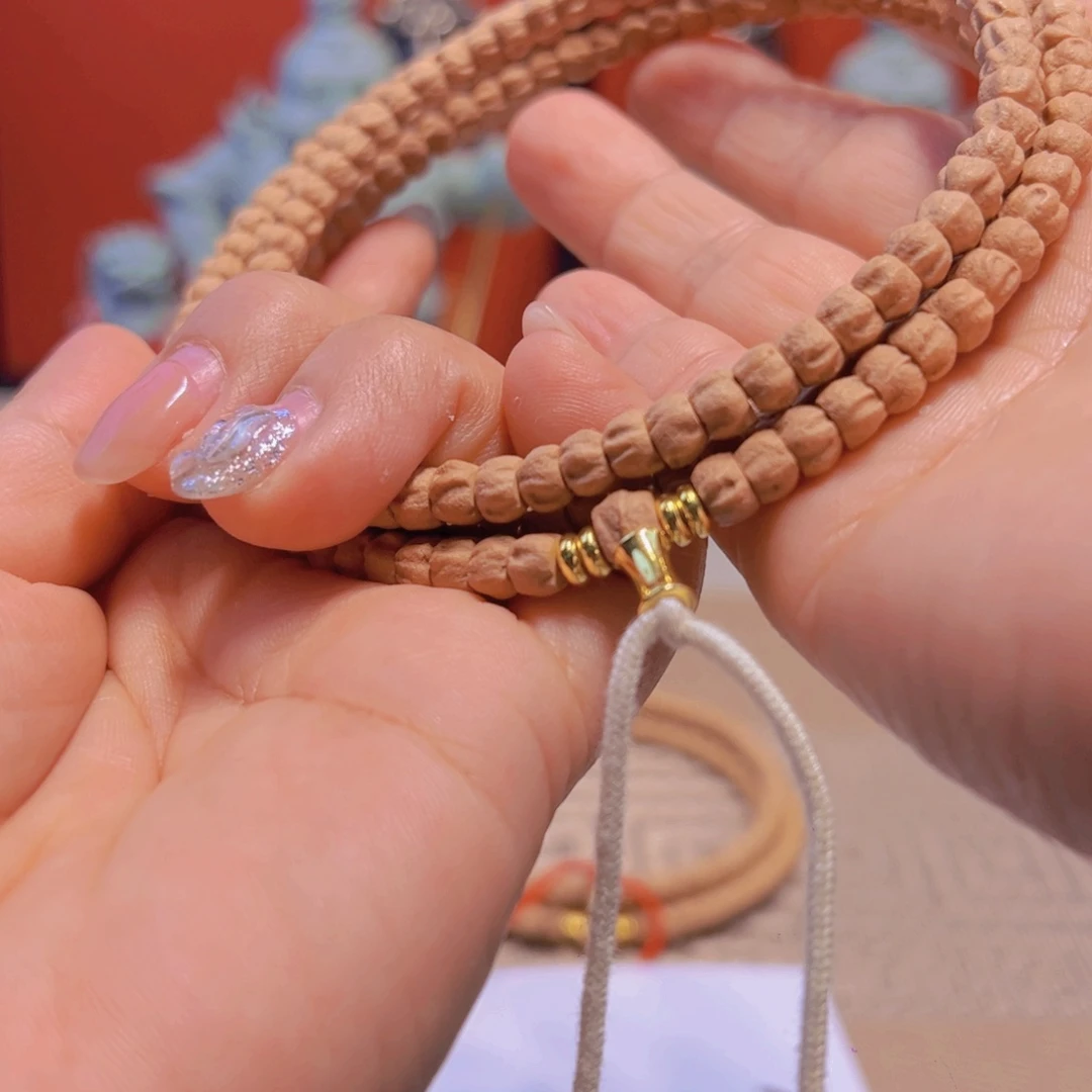 欠***儿柏香籽/百香籽吊坠