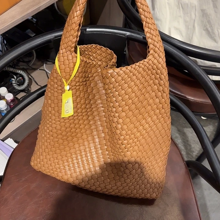 崇***店犏牛皮（革）手工包包
