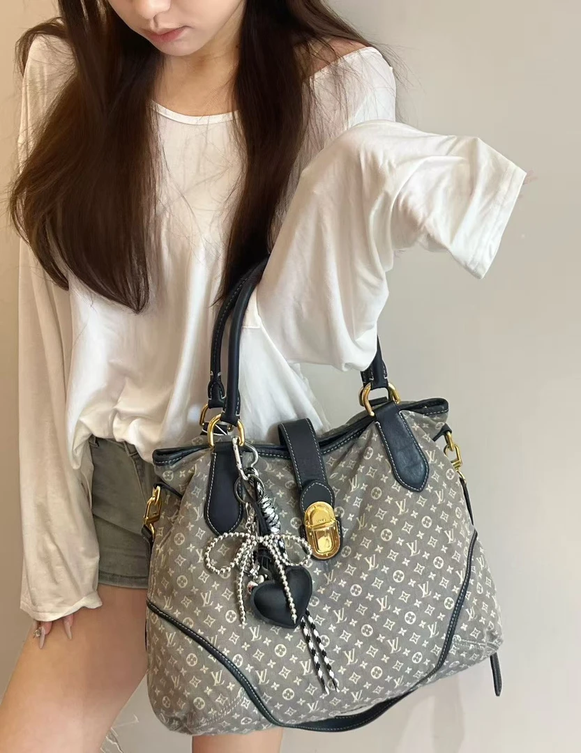 95新 LouisVuitton/路易威登 蓝色丹宁拼皮金扣元宝
