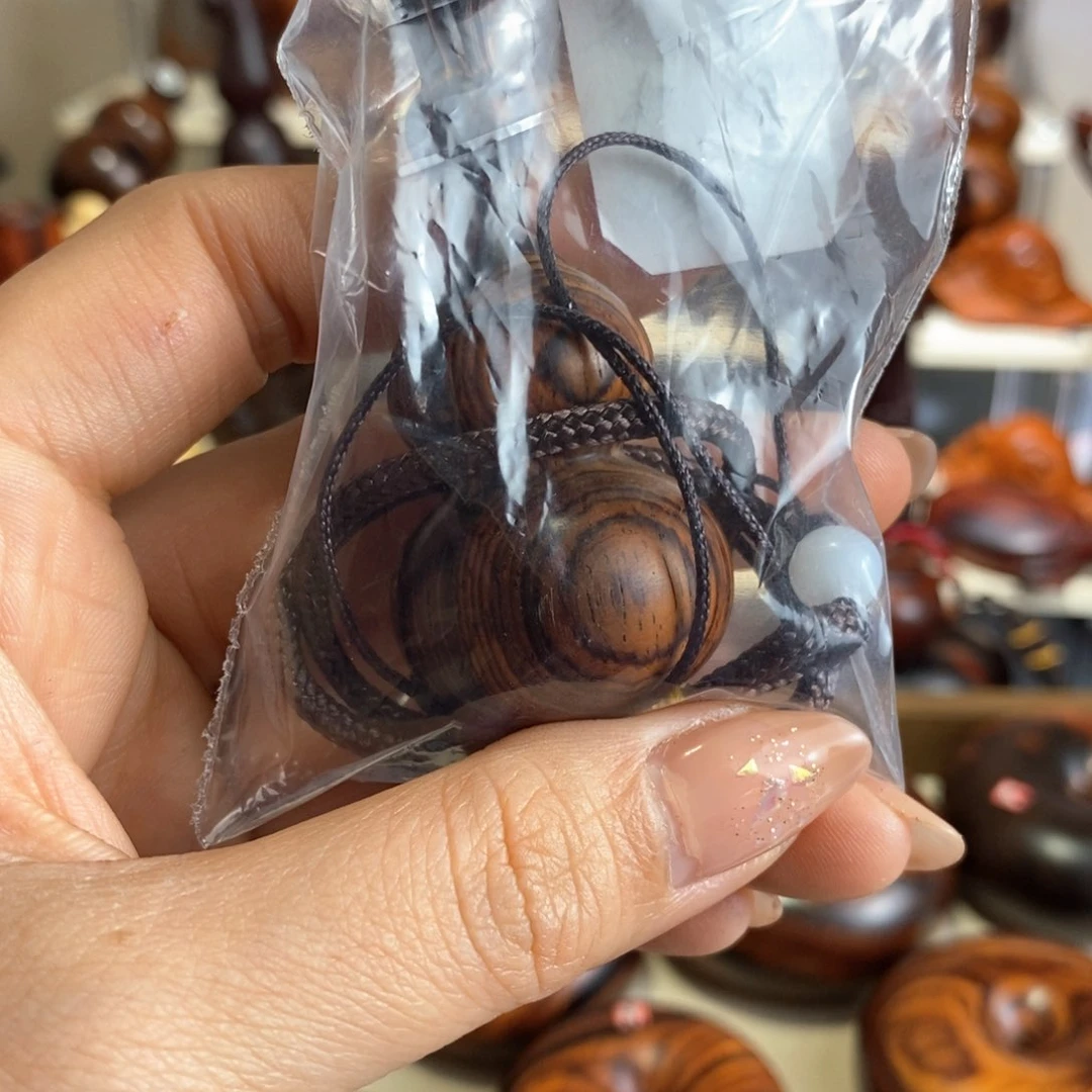 木M****?微凹黄檀葫芦手把件