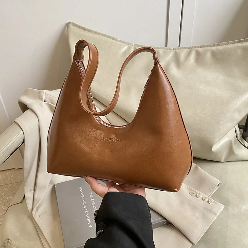 2025韩国小众包包女包手提时尚单肩包女高级感PU定型复古腋下包女