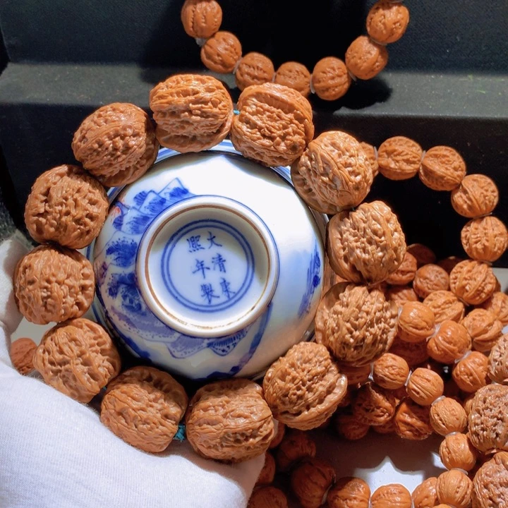 风***头文玩核桃手串白狮子