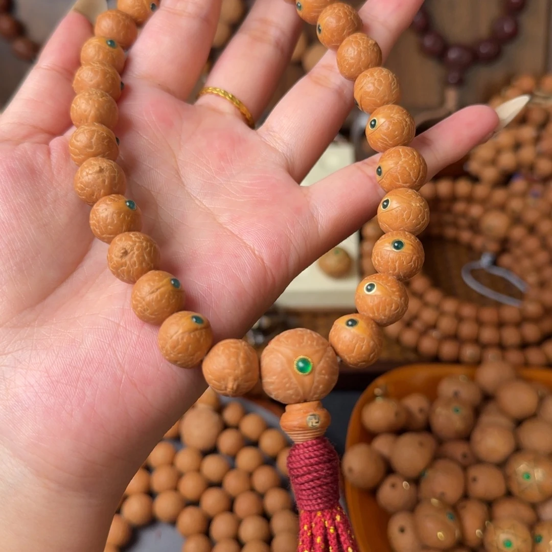 凤眼菩提把件12mm/27颗手持/镶嵌绿玛