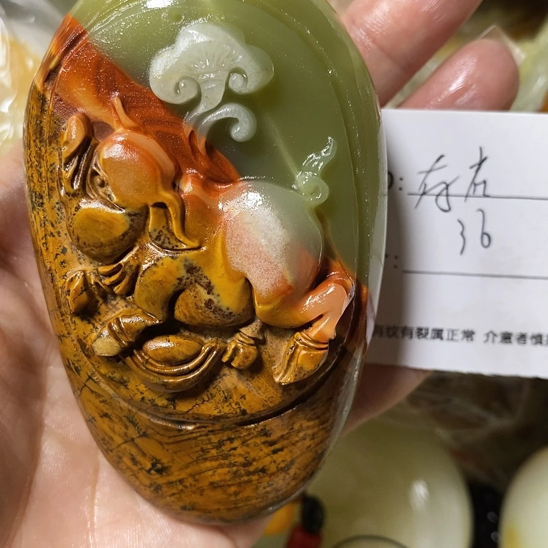 石材存**福古青石手把件